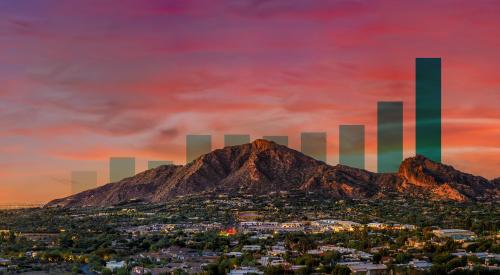 Camelback Mountain in phoenix arizona with sunset and data graph behind