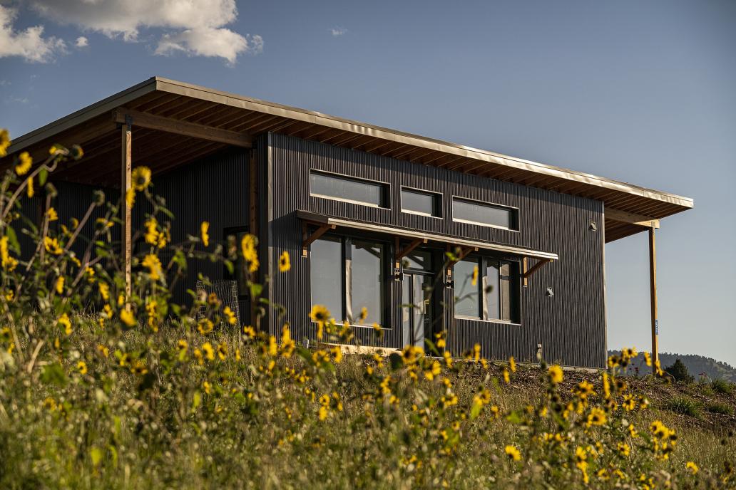 High-performance building envelope home with prefabricated panelized construction