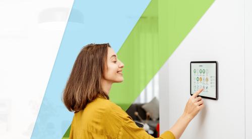 Woman in home with smart electric panel