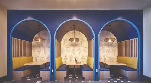 Modern booths with bold blue and yellow colors