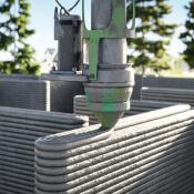 A 3-D printer prints the walls of a single-family home