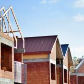 A row of homes under construction