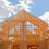 A view of a roofline on a house that remains under construction