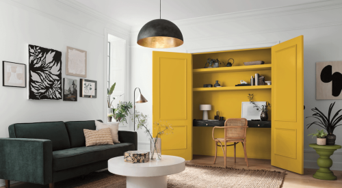 Living room showing Sherwin-Williams' Kingdom Gold Loneliest Color