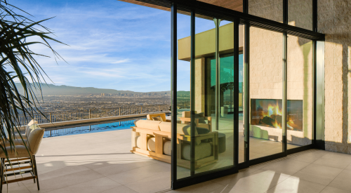 The New American Home includes Western Window Systems' Series 600 Multislide Doors 