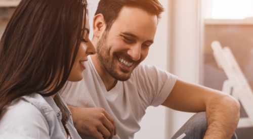 Man and woman together smiling